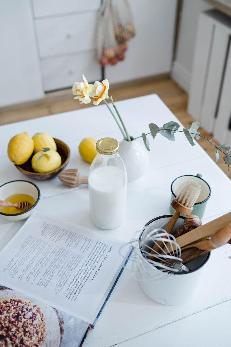 Ingredients beside a Cook Book